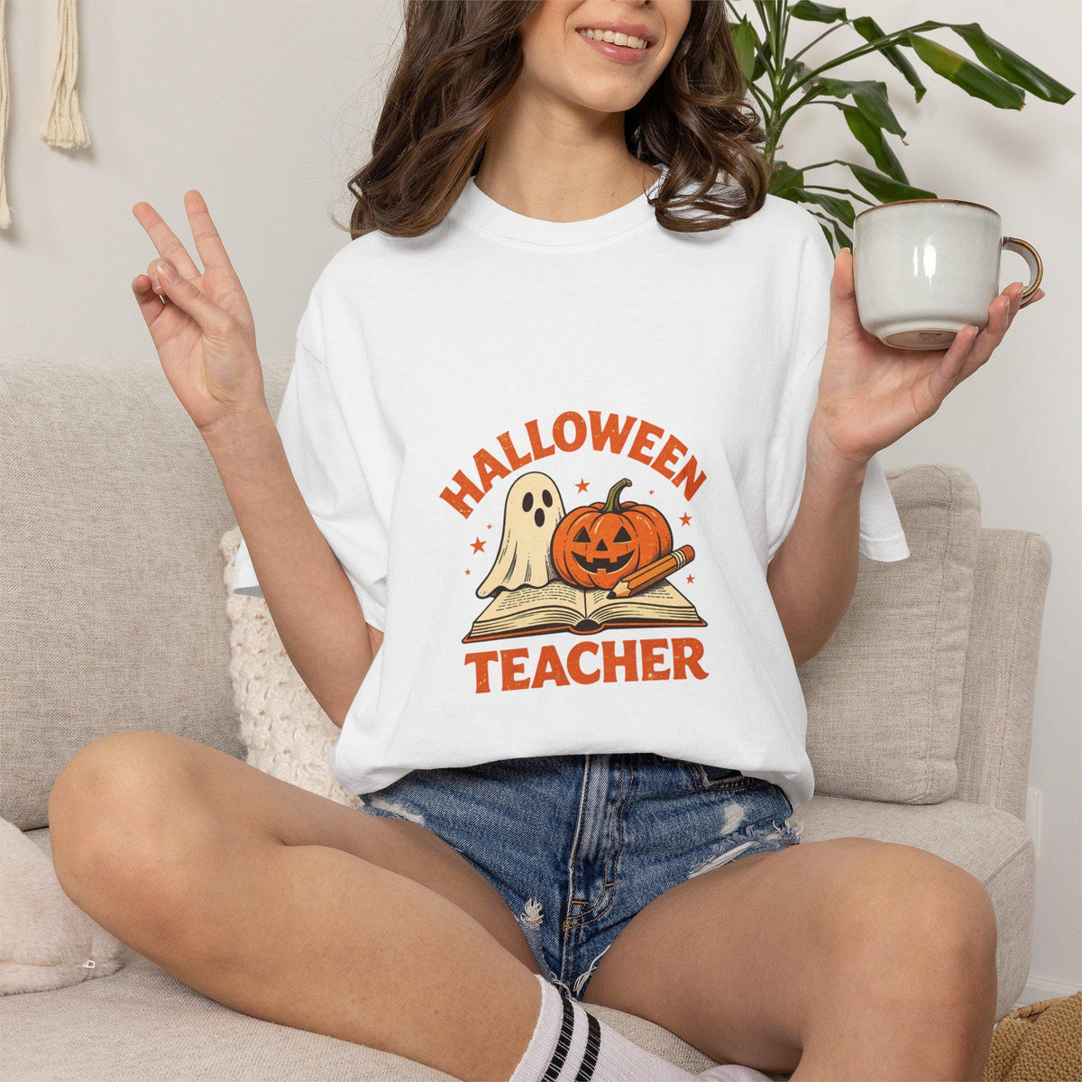 Halloween Teacher T-shirt | Ghost and Jack-o'-Lantern Book Illustration